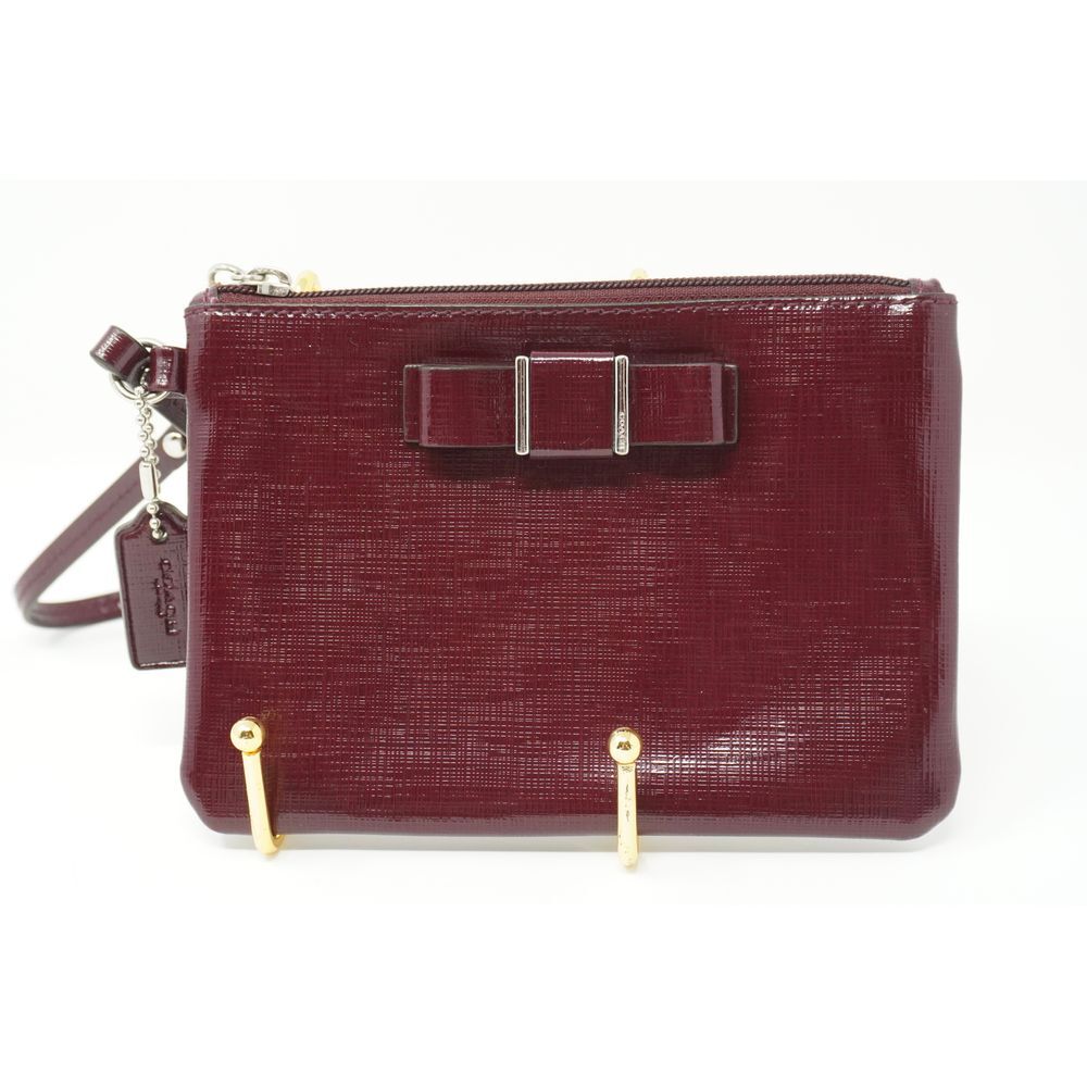 Coach Darcy Patent Bow Small Wristlet Sherry Burgundy‎ Silver Tone Textured
